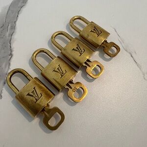 SOLD!! Authentic LV keys. Numbers 316, 313, 307, and 306. Selling as a set of 4.